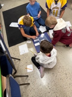 Students completing a design challenge