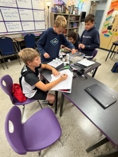 Students completing a design challenge