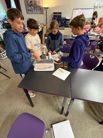 Students completing a design challenge