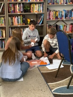 Students completing a design challenge