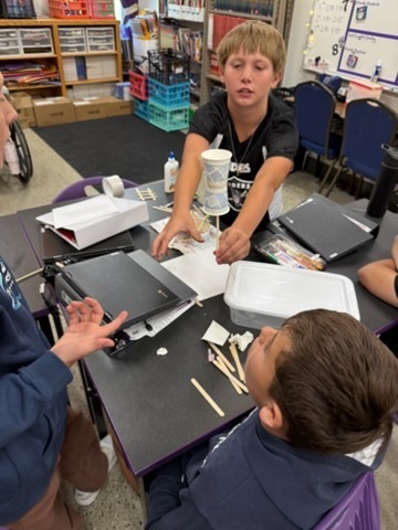 Students completing a design challenge