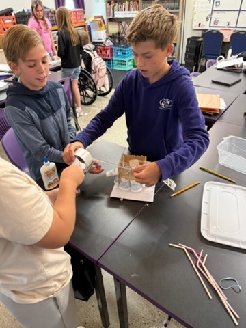 Students completing a design challenge