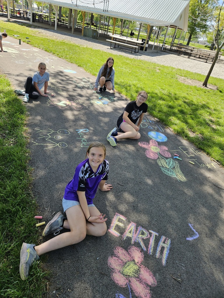 Students celebrating Earth Day with chalk