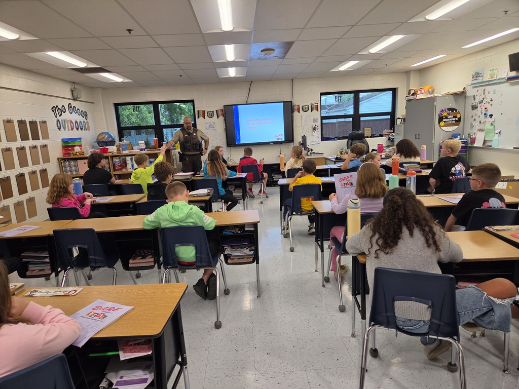 5th Grade students working hard learning about the D.A.R.E program.