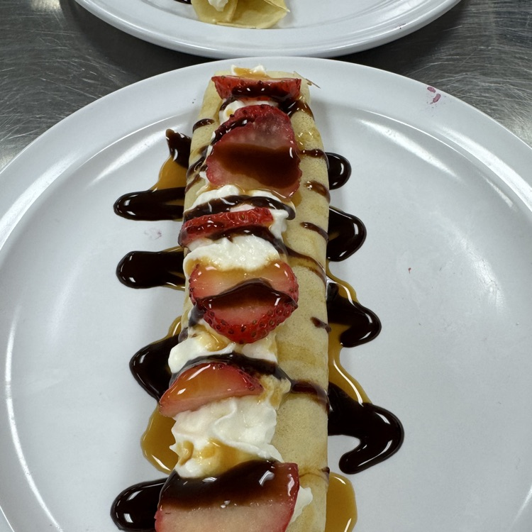 learning about French cuisine, making and plating Crepes