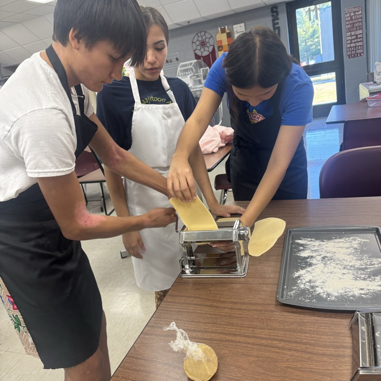 making homemade Fettuccini pasta and Alfredo sauce