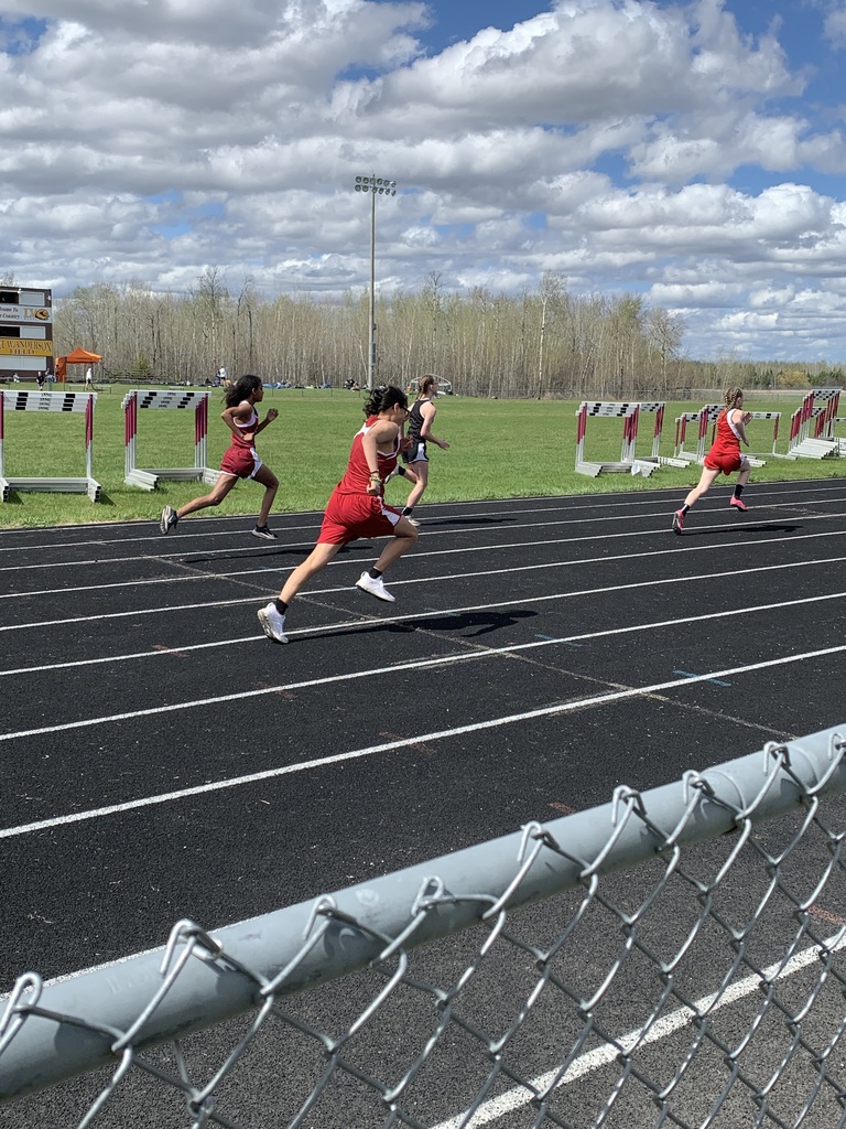 Girls running on a track