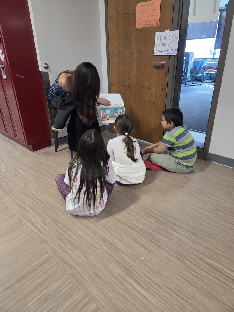 Reading with our Panther friends.