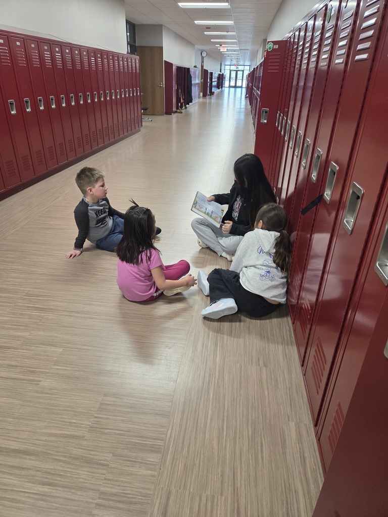 Reading with our Panther friends.