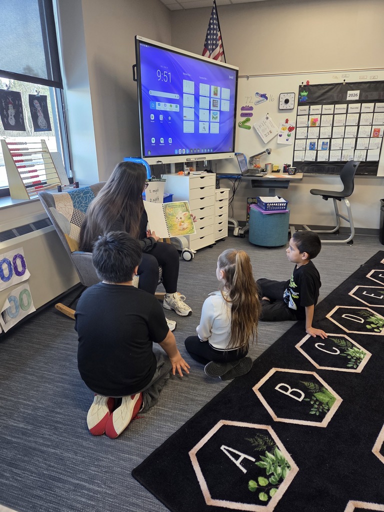 Reading with our Panther friends.