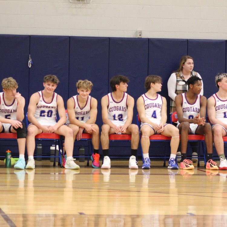 The boys getting ready to be called out on the court!
