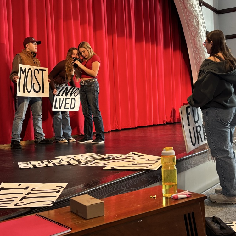 Xabrina Showing the photos to Emma Daigle and Austin Gloss