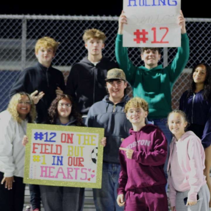 Student Cheering In Stands - #12 on the field but #1 in our hearts