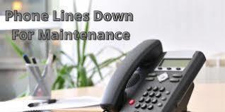 Picture of telephone with text phone lines down for maintenance