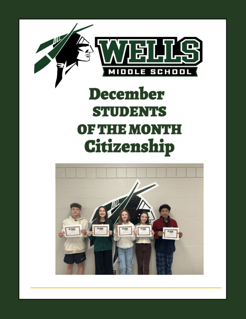 Wells Middle school with indian head logo December Students of the month posing with awards