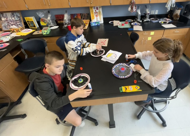 Students work on cell projects.