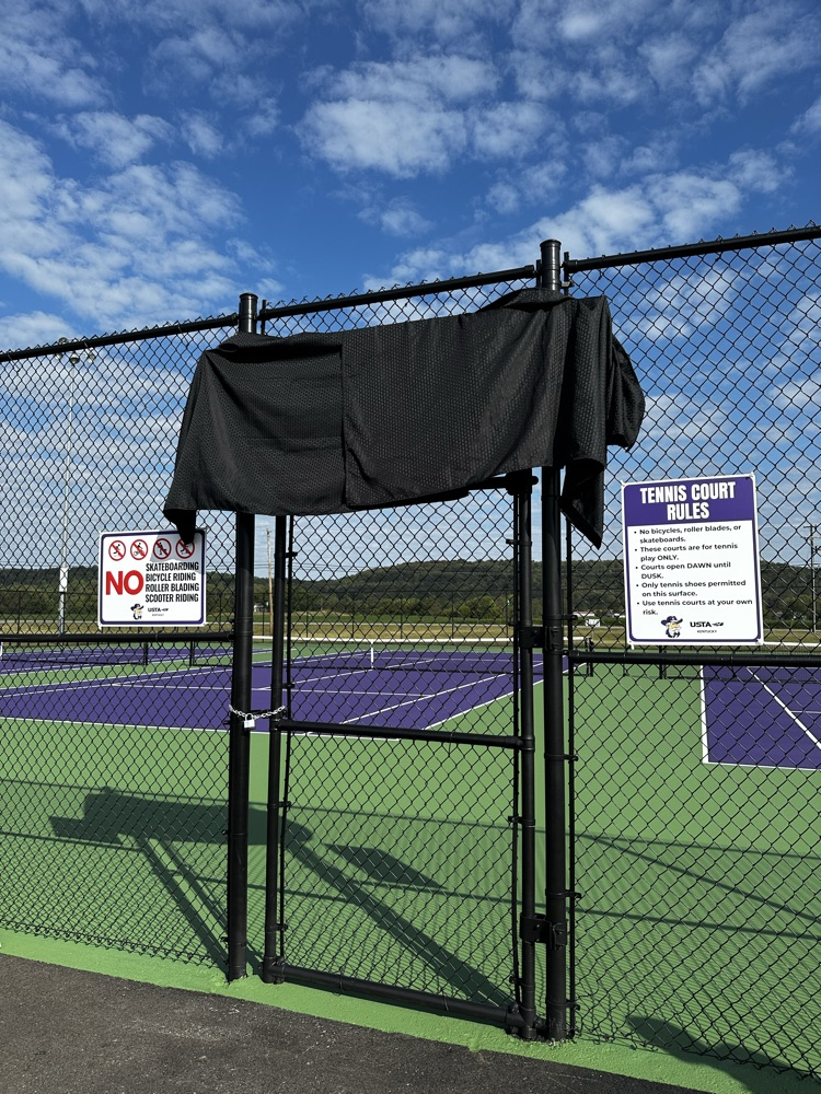 tennis court sign covered