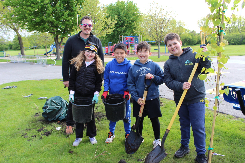 Students planting trees at Westfield with Karl Mennecke