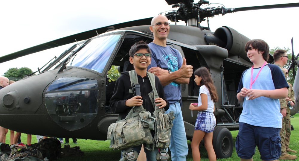 Student and Pat Doyle at helicopter