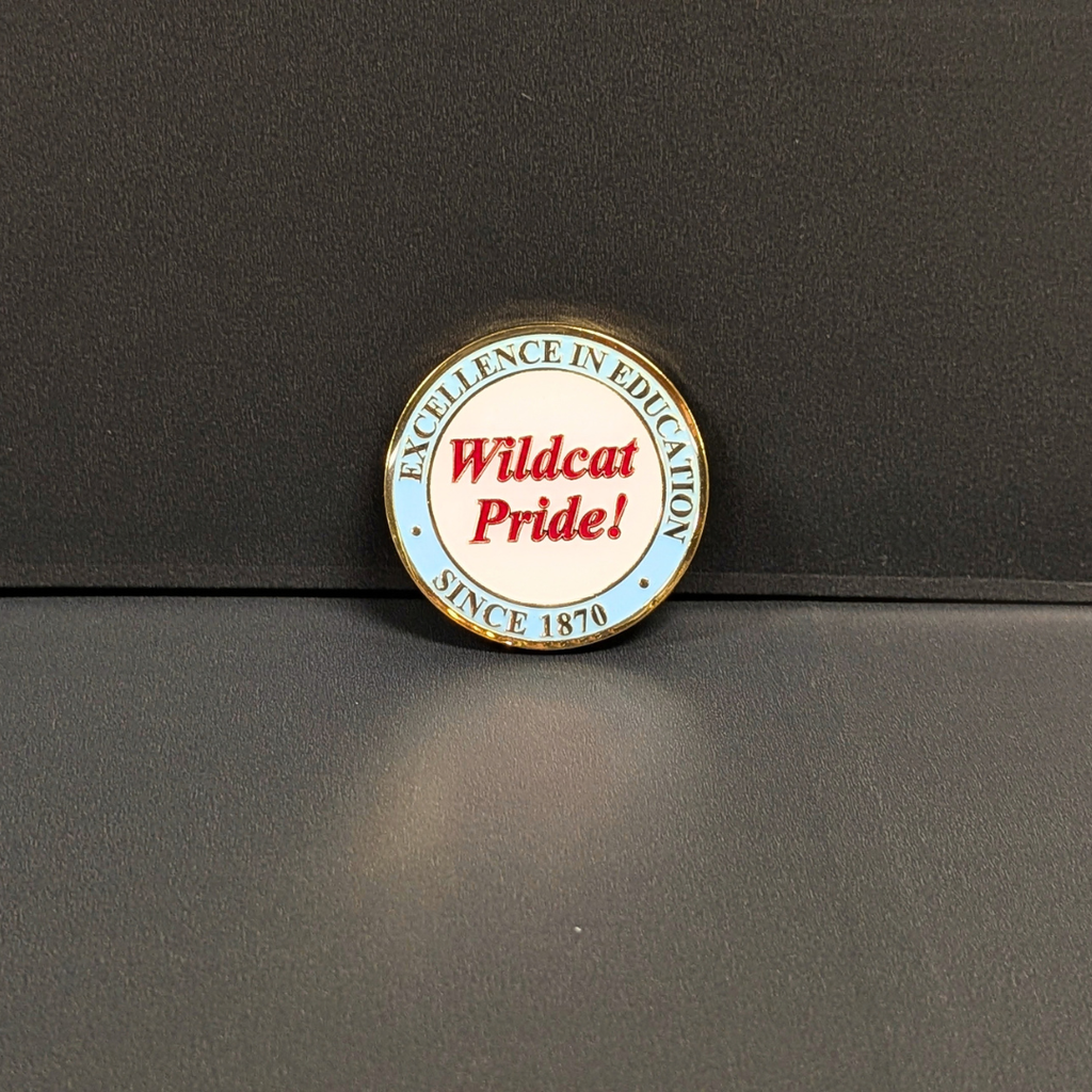 Back side of coin. Includes Wildcat Pride! in red text in middle of coin and Excellence in Education since 1870 around border.