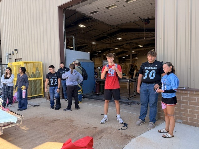Senior class talking about what needs to be completed for float