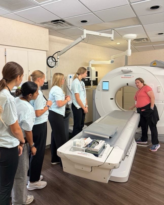 Dove Day students looking at MRI machine