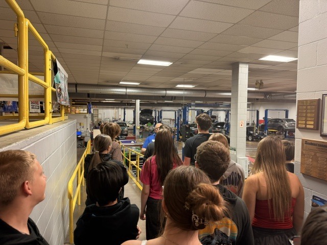 Students viewing automotive shop classrooms