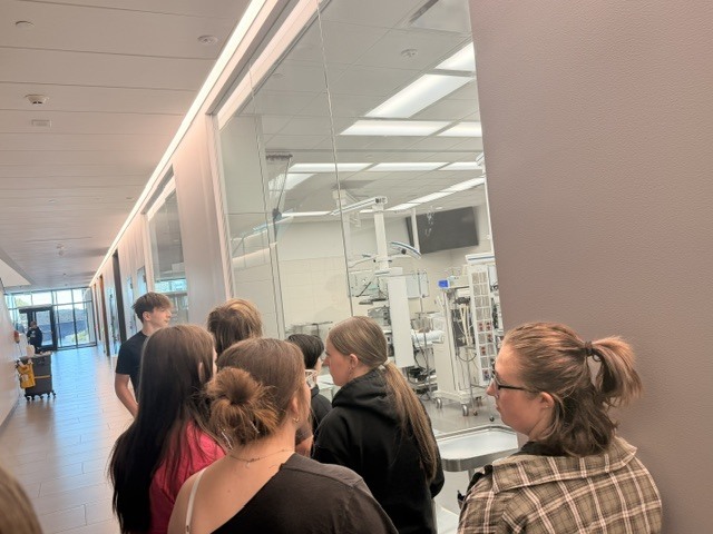 Students viewing medical setting classroom