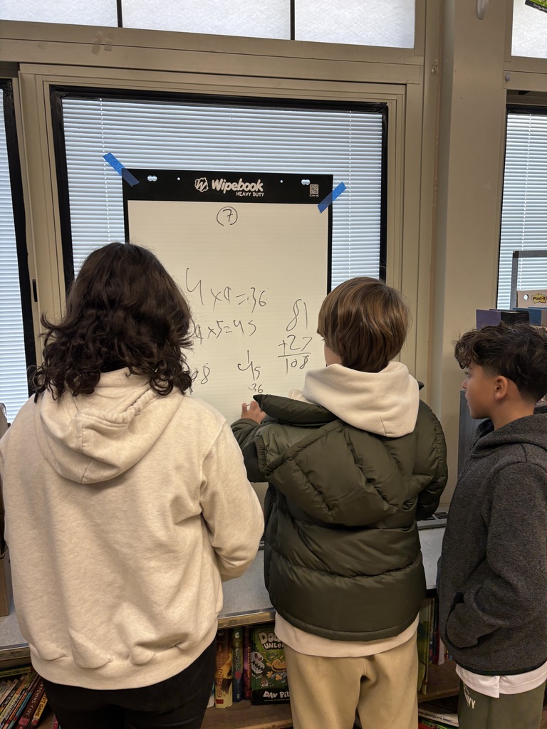 Students at whiteboard