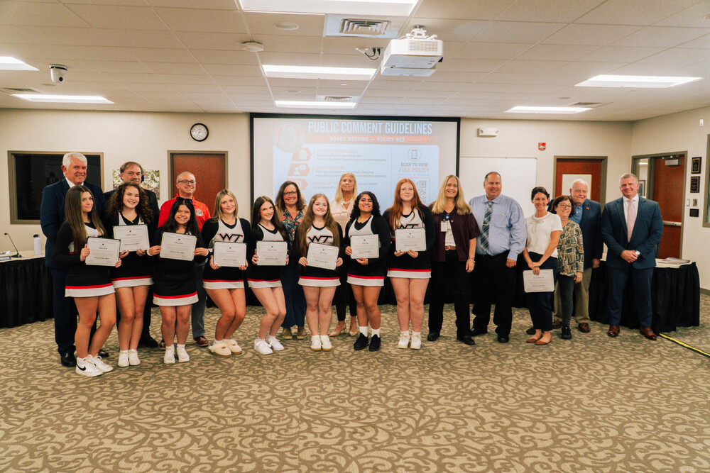 WTHS Cheerleaders Honored at School Board Meeting for Food Drive Success