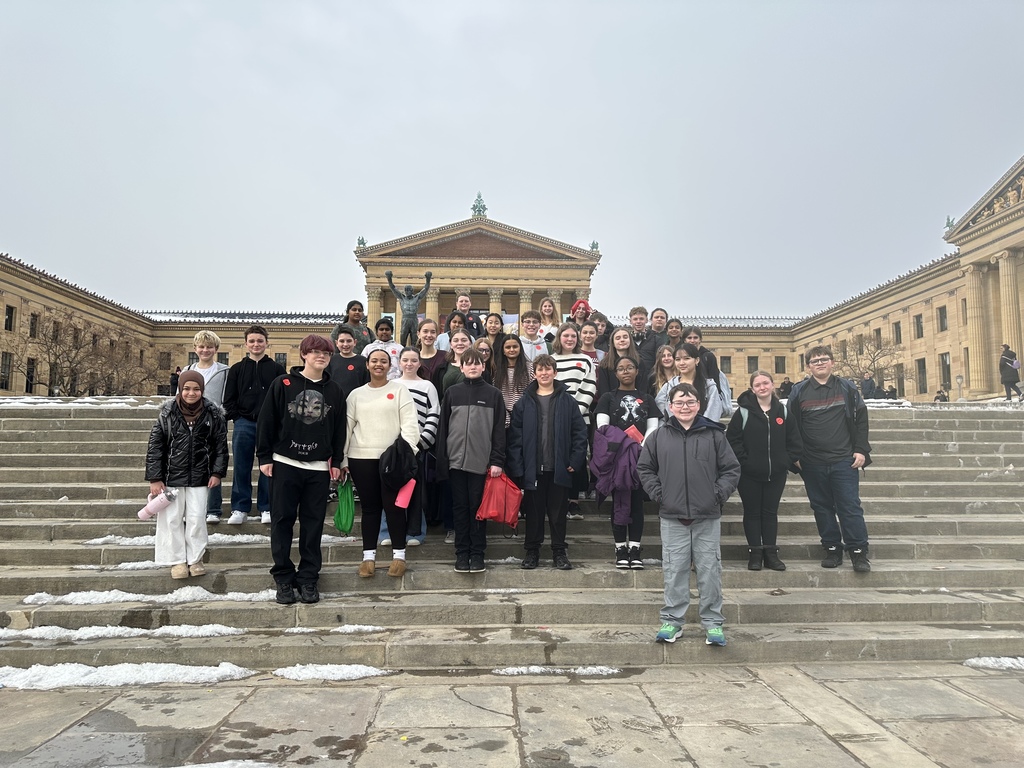 Klinger and Log College students taking a group photo during a school trip