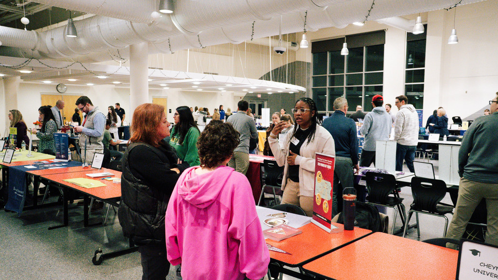 Parents and students attending the WTHS College Fair on March 6, 2026