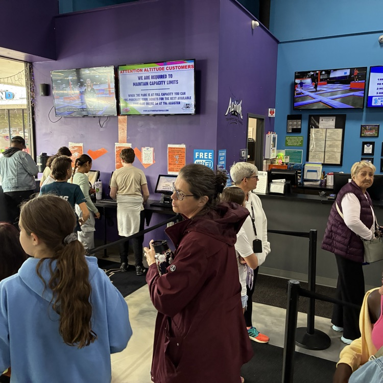 people waiting in line to jump