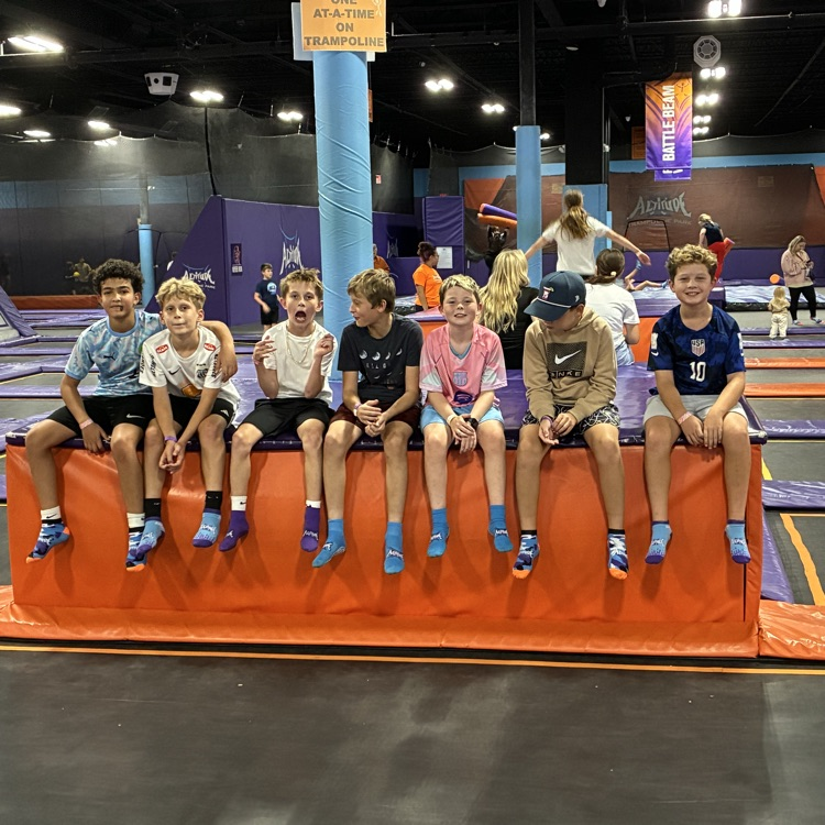 group of boys sitting 