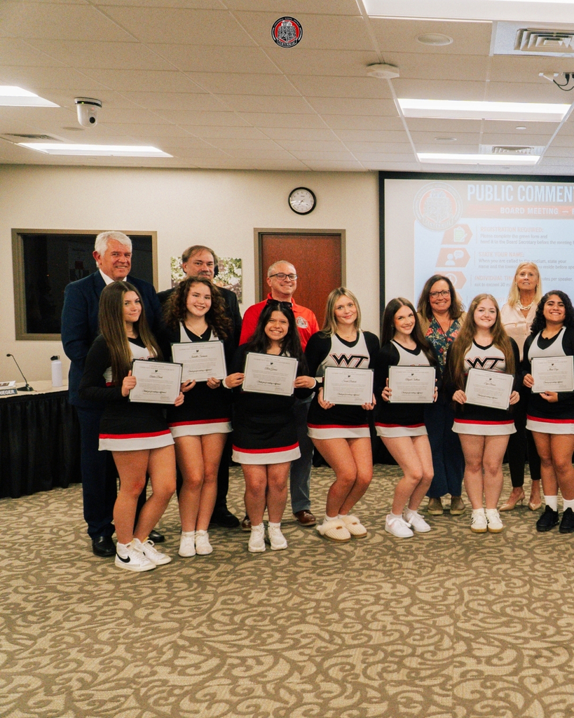 WTHS Cheerleaders Honored at School Board Meeting for Food Drive Success