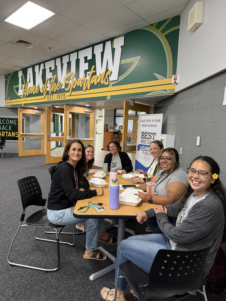 staff at table in new lakeview common area