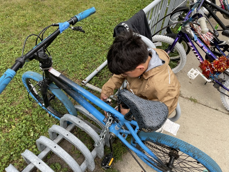 Stephen locking his bike up