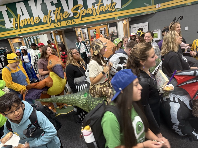 dinos in crowded lobby