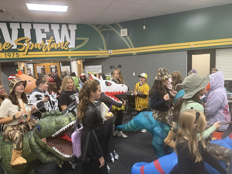 dinos in crowded lobby