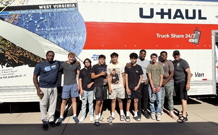 HS football team helped our new Superintendent, Mr. Dutton and his family move over the weekend.