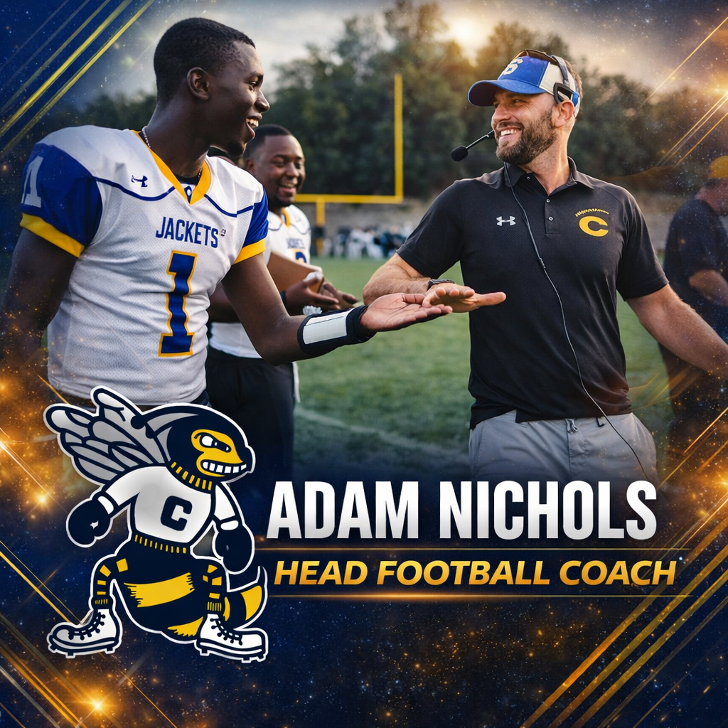 CHS Head Football Coach Adam Nichols low fives CHS football player in #1 jersey.