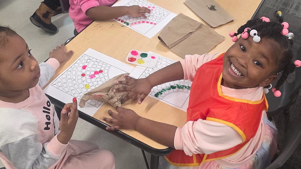 Yellowjacket Early Learning Center students create colorful artwork to celebrate Black History Month.
