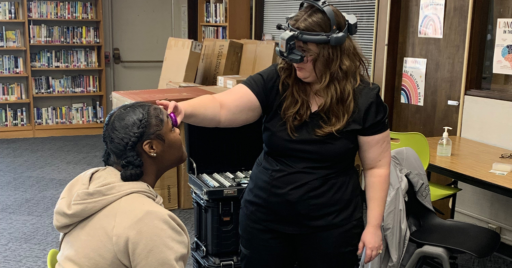 Student receives eye exam from Access KC.