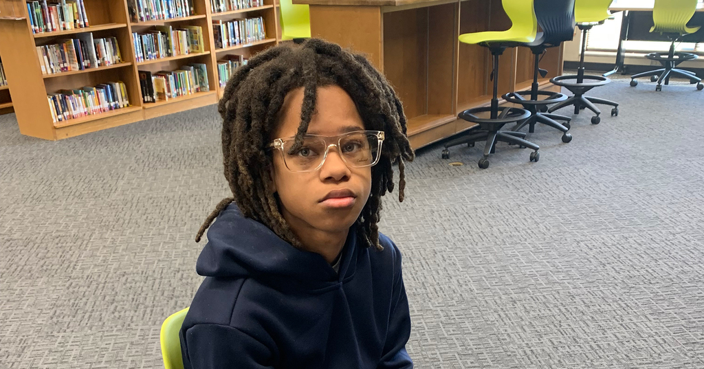 Student receives new glasses from Access KC.