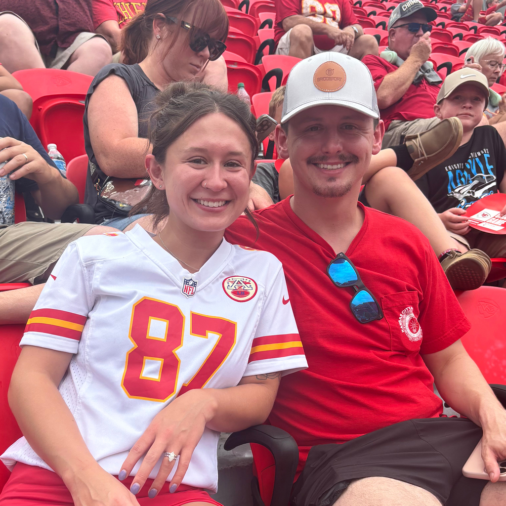 Indian Creek Elementary teacher Lainey B. and her husband sit in the stands at the Chiefs preseason game.