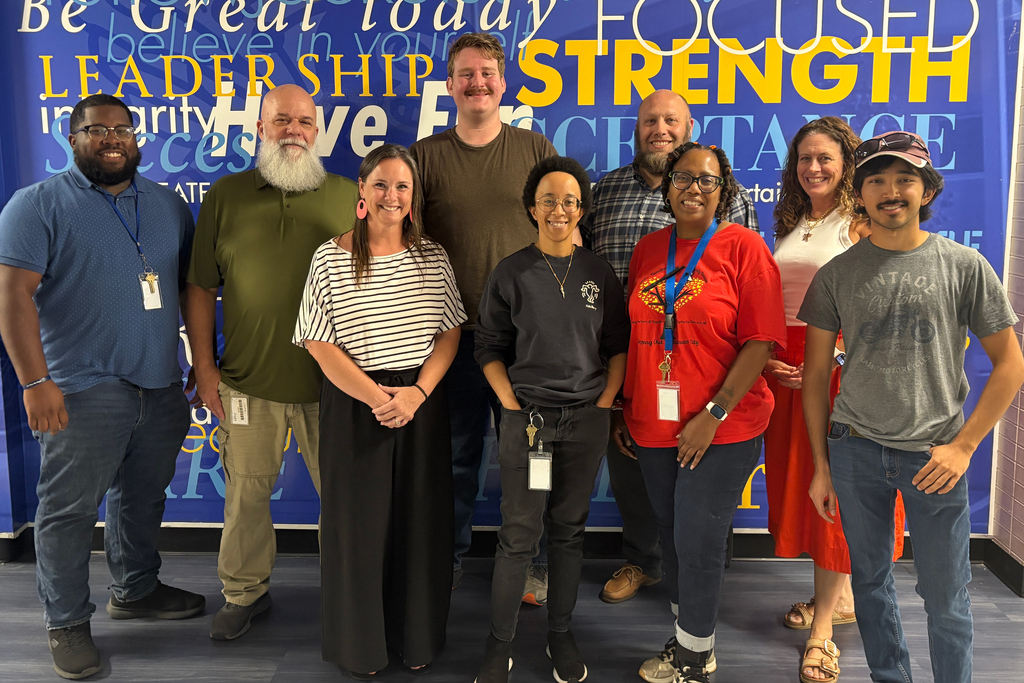 Center School District Technology Team stands in a group, smiling.