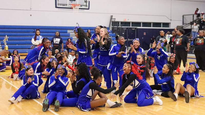 Center Middle School cheerleaders celebrate their championship win.