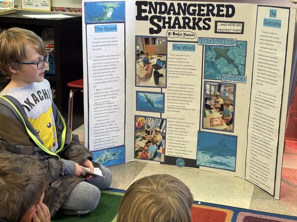 Hendrix Penrose presents to his class about his project.