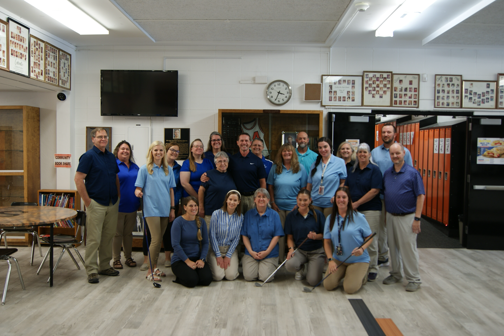 staff in commons with some golf clubs