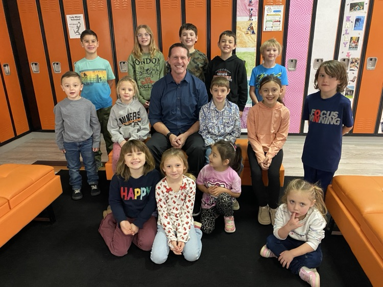 students with the principal